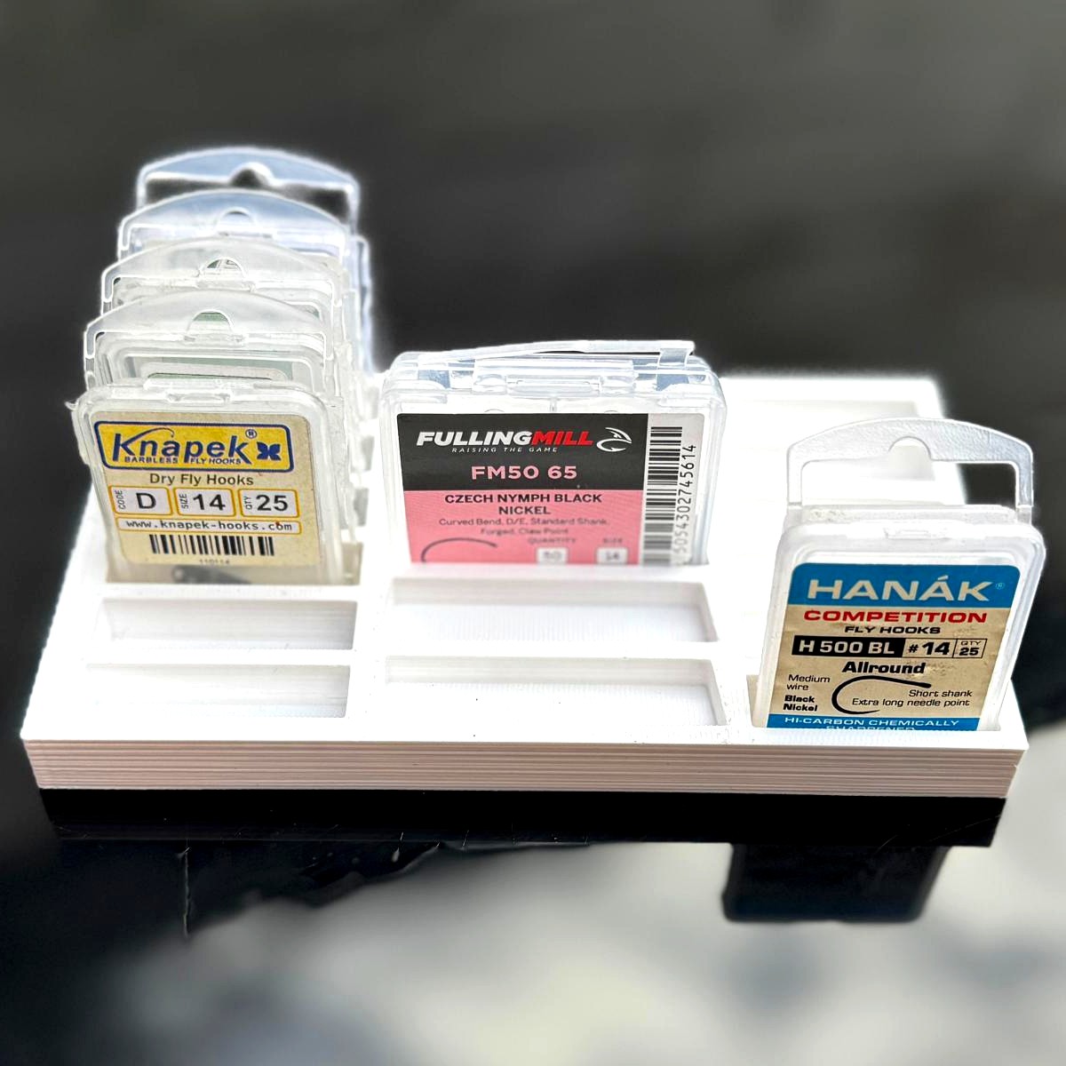 Custom multi-brand fly-tying tray holding Knapek, Fulling Mill and Hanak hook boxes